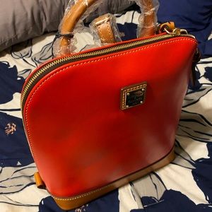 Brand new Dooney and Bourke All Leather backpack with tags